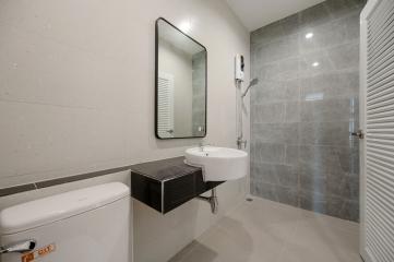 Modern Bathroom Interior with Gray Tiles