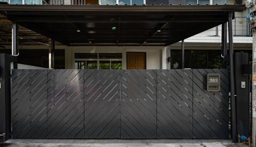 Modern house facade with sliding gate