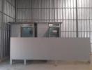 Industrial style office front desk with metal walls