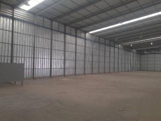 Spacious empty industrial warehouse interior