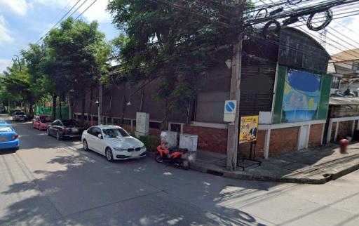 Street view with buildings and parked cars