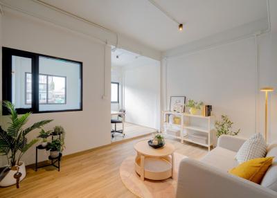 Spacious living room with contemporary furniture and ample natural light