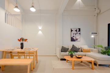 Modern and bright living room with dining area