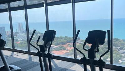 High-rise gym with panoramic sea views and cardio equipment