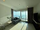 Spacious living room with natural light and scenic ocean view