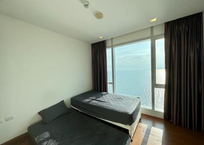 Bright bedroom with a sea view and minimalistic design
