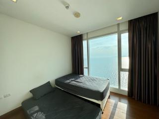 Bright bedroom with a sea view and minimalistic design