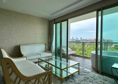 Elegant living room with balcony access and city view