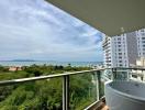 Spacious balcony with ocean view and hot tub