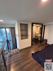 Modern bedroom with floor-to-ceiling windows and city view