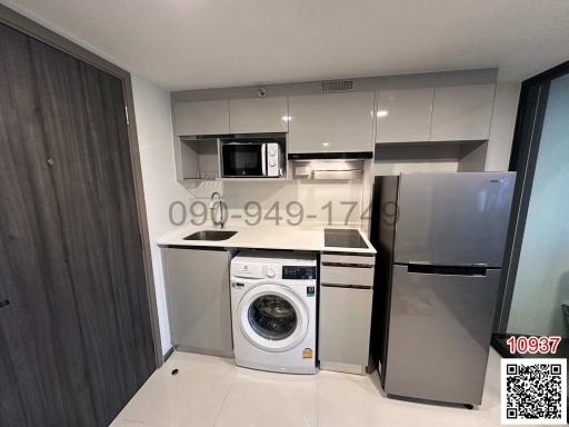 Modern kitchen with stainless steel appliances