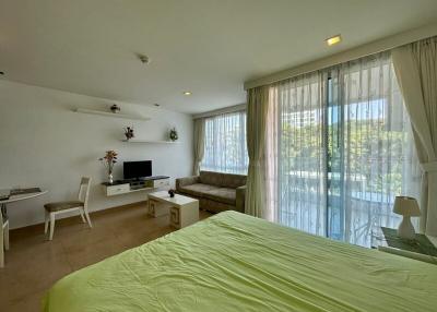 Bright and spacious bedroom with natural light and modern decor