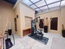 Spacious home gym with modern equipment and decorative elements