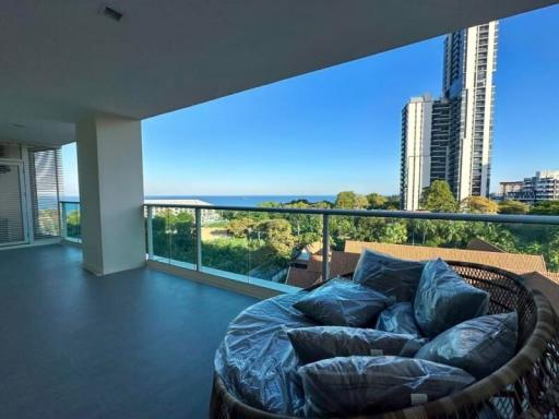 Spacious balcony with sea view and comfortable outdoor seating