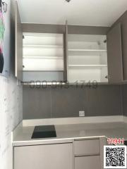 Modern kitchen interior with empty shelves and closed cupboards