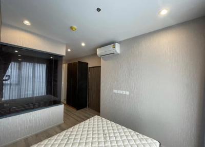 Spacious and modern bedroom with ample lighting