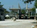 Unfinished building construction site with structural columns in place