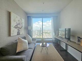 Bright and contemporary living room with balcony access