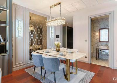 Elegant dining room with chandelier and modern decor