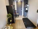 Modern hallway interior with exercise equipment and air purifier