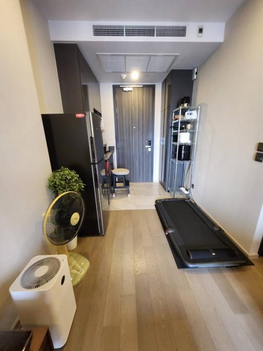 Modern hallway interior with exercise equipment and air purifier