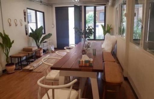 Spacious dining room with large table and natural light