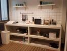 Modern kitchen with white tiling and open shelving