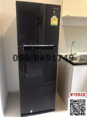 Modern black double door refrigerator in a kitchen setting