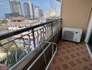 Spacious balcony with city view and tiled flooring