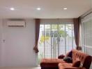 Spacious living room with natural lighting