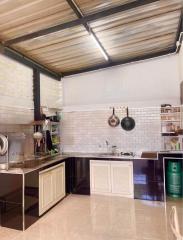 Modern kitchen with stainless steel appliances and white subway tile backsplash