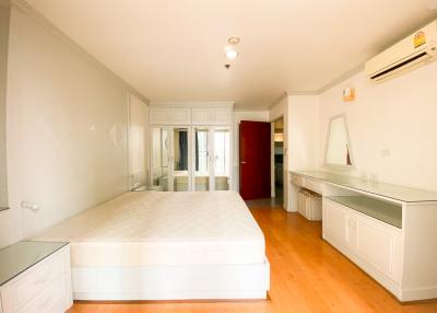 Spacious bedroom with integrated kitchenette and air conditioning