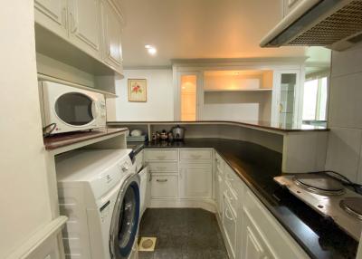 Compact fully-equipped kitchen with modern appliances