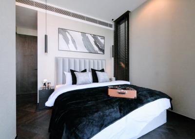 Modern bedroom with a king-sized bed and stylish decor