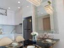 Modern kitchen with elegant dining set and chandeliers