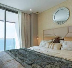 Elegant bedroom with large window and modern design