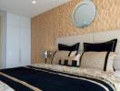 Elegant modern bedroom interior with decorative bedding and wall design
