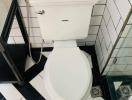 Modern bathroom interior with black and white checkered floor