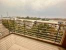 Spacious balcony with a city view