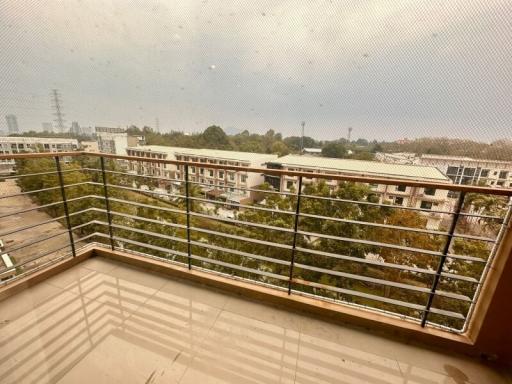 Spacious balcony with a city view