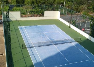 Tennis court surrounded by nature