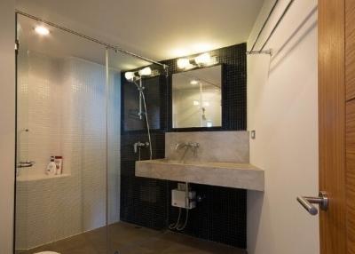 Modern bathroom with shower and stylish sink