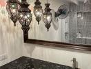 Elegant bathroom with decorative hanging lights and modern fixtures