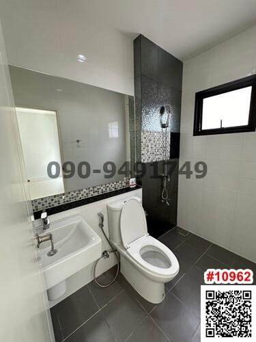 Modern bathroom with clean design and tiled walls