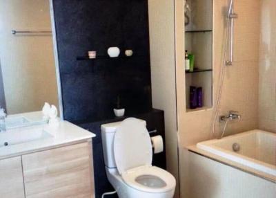 Modern bathroom interior with a shower and a toilet