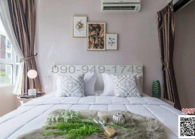 Cozy bedroom interior with modern decor and wall art