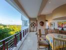 Spacious balcony with dining area and panoramic views