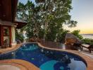 Luxurious outdoor space with a private pool and stunning sunset view
