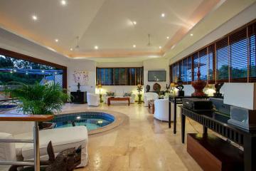 Spacious and elegant living room with indoor pool