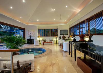 Spacious and elegant living room with indoor pool